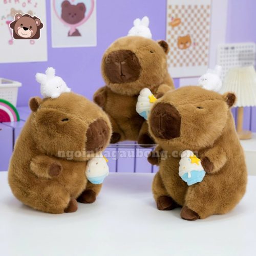 Gấu Bông Capybara Ôm Kem Đội Thỏ