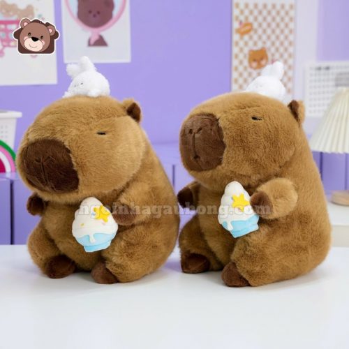 Gấu Bông Capybara Ôm Kem Đội Thỏ